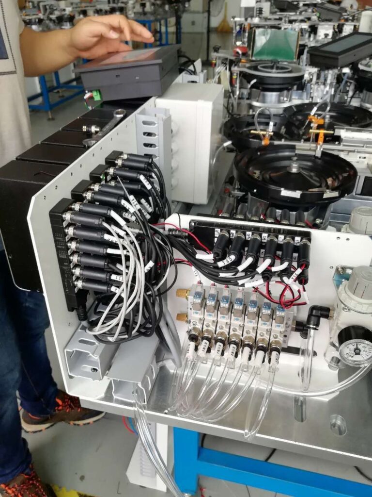 Organised industrial wiring and connection points inside automation equipment