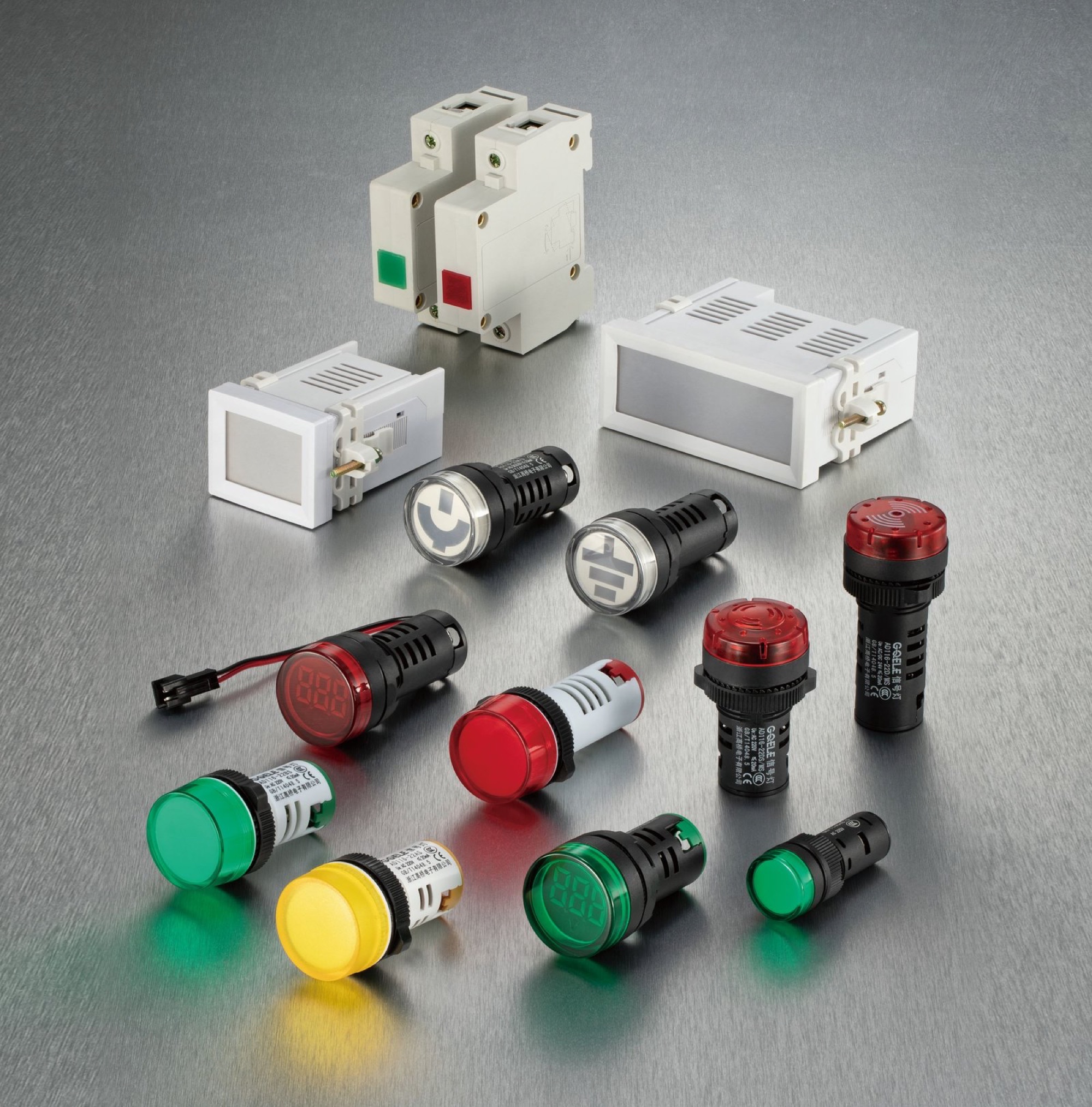 Emergency stop switches, pushbuttons and signal devices on a graphite work surface