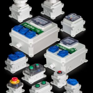 Protected electrical control boxes and socket enclosures on a dark background